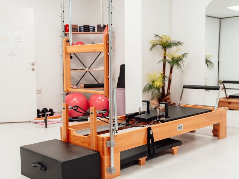 Minimalist fitness equipment on a clean studio floor